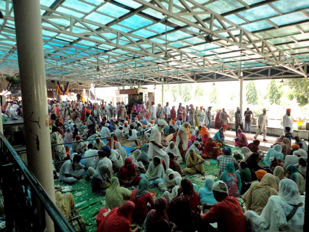 The free lunch or 'langar' being prepared. Hundreds eat, Hundreds help.