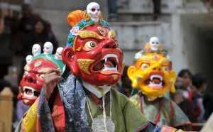 Elaborated masks worn for the play (Source)
