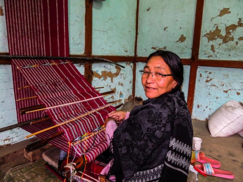 Monpa woman weaving a shinka
