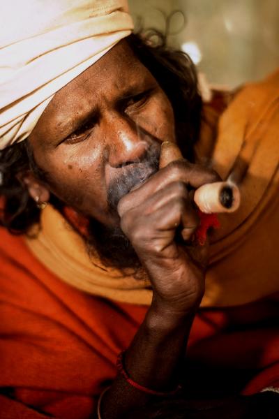 Baba smoking some 'Baba' (Source)