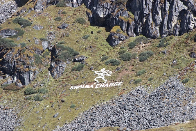 Signs that dot the landscape on the way to the border