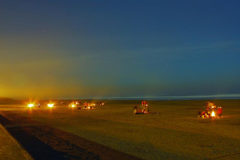 Bonfire by many groups at the beaches in Goa