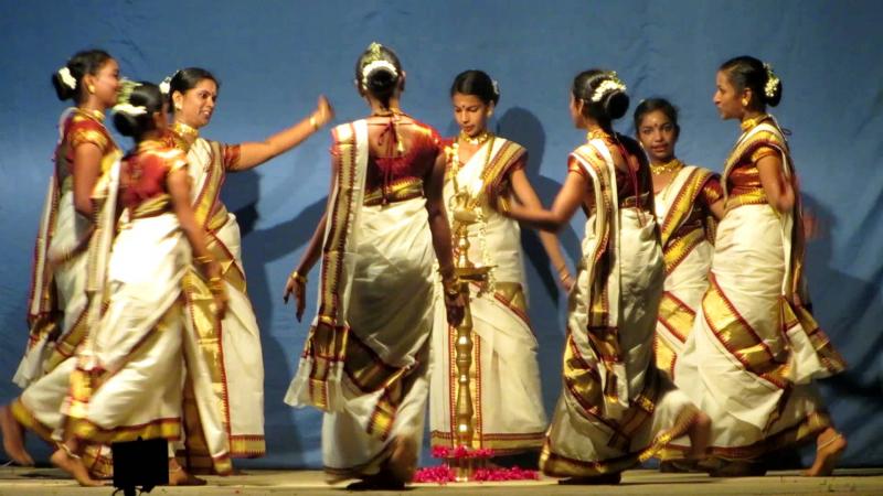 Women dancing and singing songs for Kamadeva_Thiruvathira_Festivals of Kerala