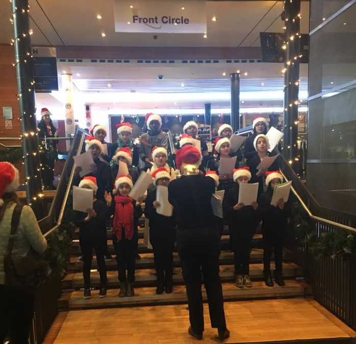 Choir performing at the Front Circle at Birmingham Hippodrome, England