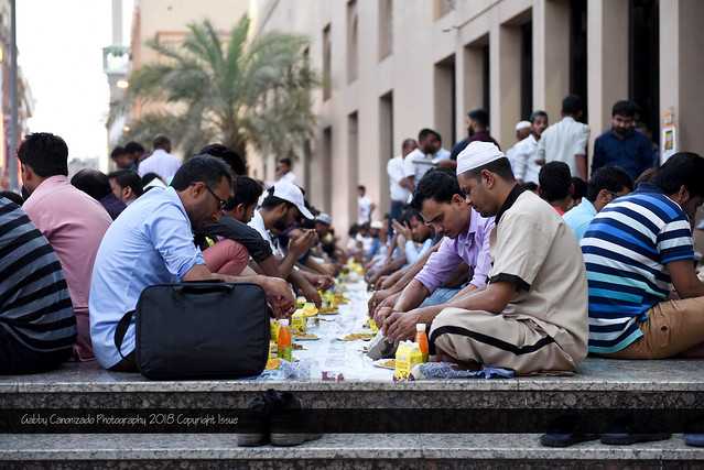 A mosque in UAE providing Iftar (breakfast) meals to Muslims, after sundown, to break their fasts during Ramadan