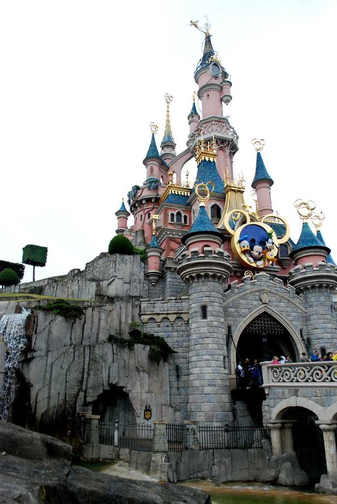 Night performance near Sleeping Beauty castle in Disneyland Paris. Disneyland  Paris (Euro Disney Resort) - entertainment resort in Marne-la-Vallee.  Marne-la-Vallee, France. March 30, 2019. Stock Photo