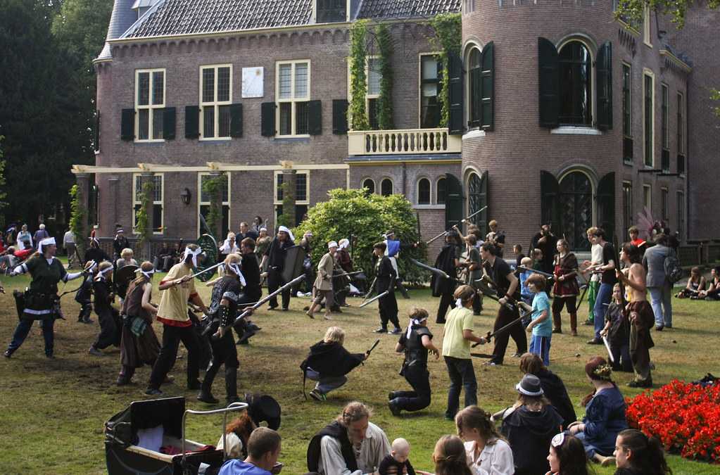 Kids engaged in a combat in front of the Castlefest Castle in 2011 