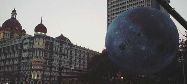 The view of the replica of the moon in the Museum of Moon exhibition  at Gateway of India during the late evening