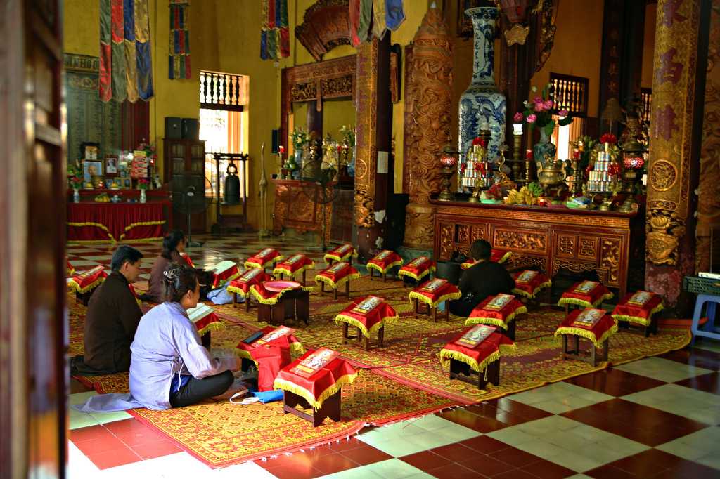 Devotees Praying at Quan Su Pagoda Hanoi Vietnam