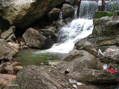 Suruli Falls forming a pool at its feet