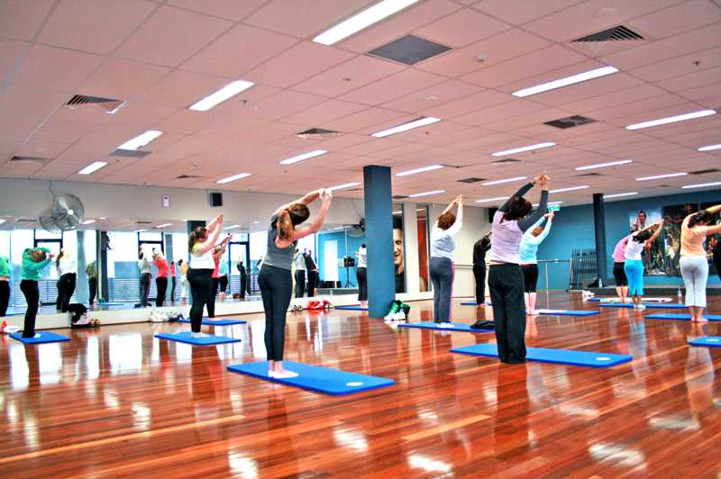 Yoga Session Besides Pool