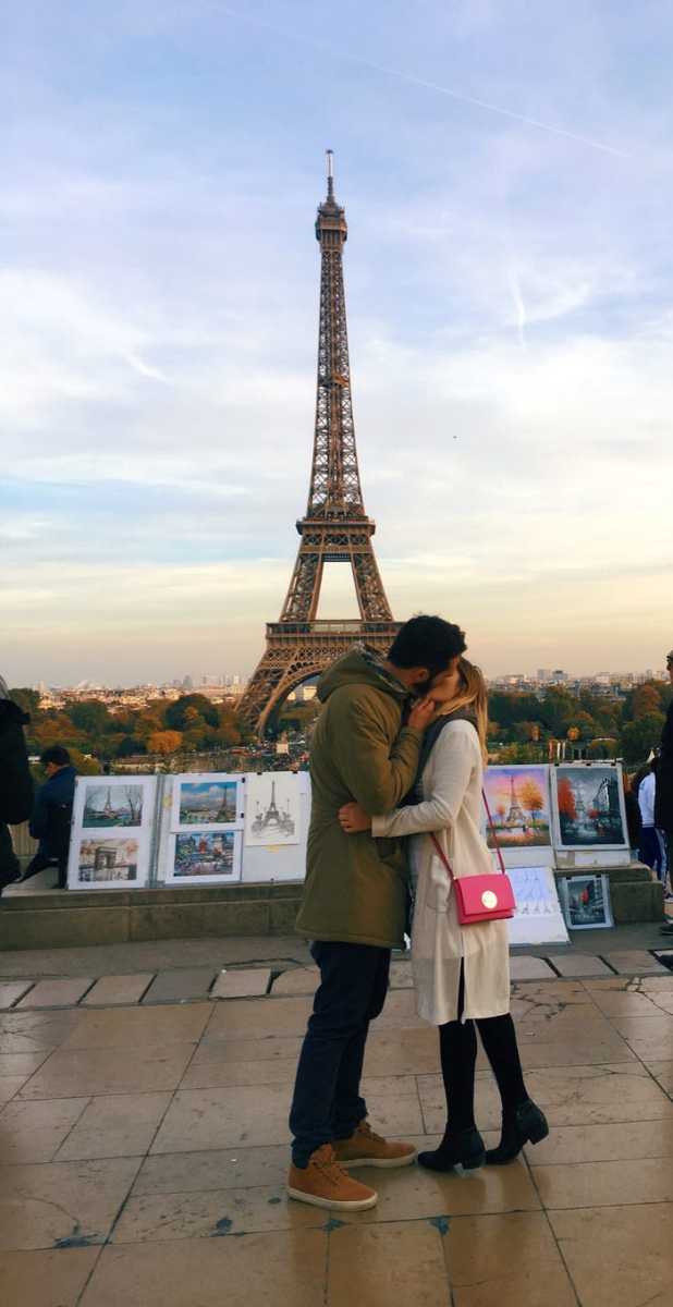 Instagram girl kisses stranger in front of eiffel tower